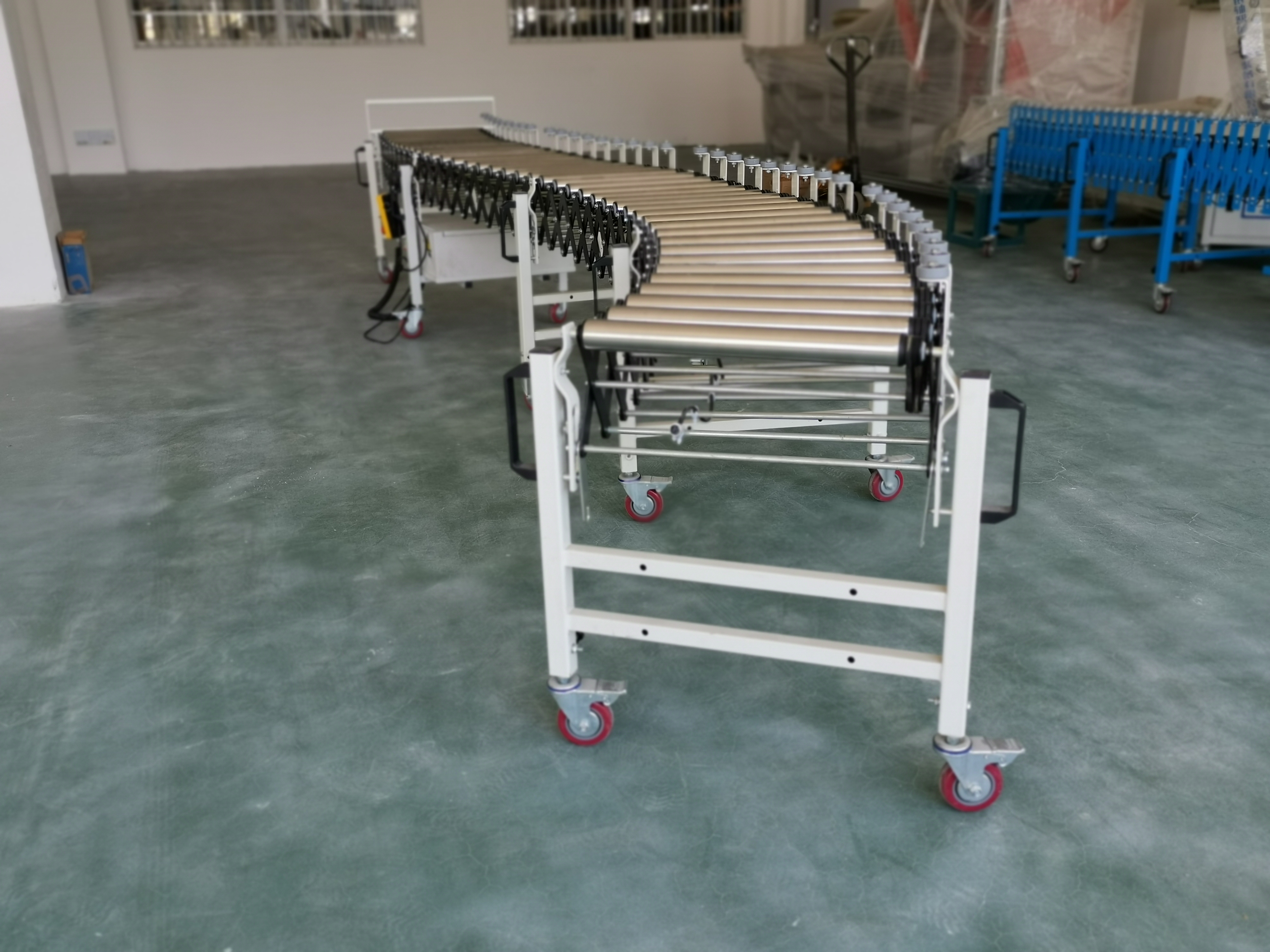 사이드 가드가있는 유연한 롤러 컨베이어